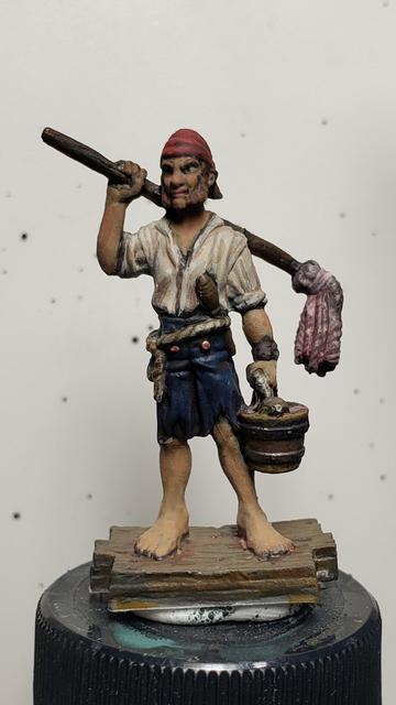 Pirate swabbie mini with a mop over his shoulder and a bucket in his other hand