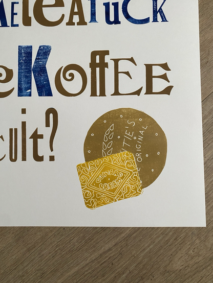 Photo of a letterpress print showing linocut if two biscuits, one digestive and partially in front of it a custard cream