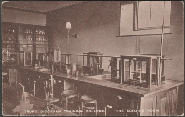 Printed sepia postcard showing a view of the Science Room of the Truro Diocesan Training College in Truro, Cornwall.

Publisher not stated, not numbered, stamp box dated 1923.

Postally unused.

Good condition, with slight corner bumps.