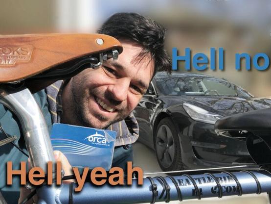 A man with dark hair and a beard smiles while holding an ORCA transit card near the leather saddle of a bicycle. In the background, a black Tesla is visible. Overlay text on the image reads “Hell yeah” near the bike and “Hell no” near the car, emphasizing a preference for cycling and public transit over driving.