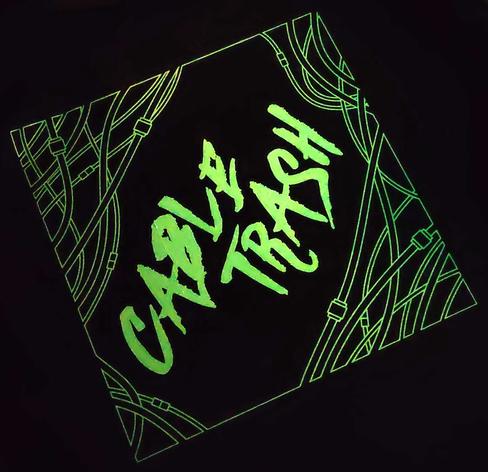CABLE TRASH logo looking neon-green, on a black background.
it is screen-printed on fabric.