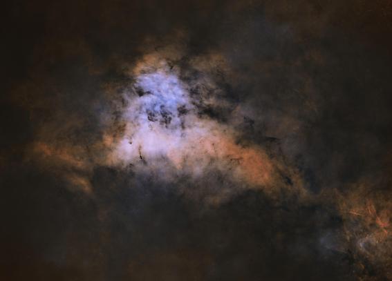 Starless image of part of the Sadr region in Cygnus showing lots of Ha, some OIII and some veins of dark nebulosity