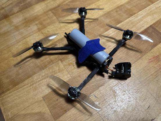 A v smol drone detached from its camera