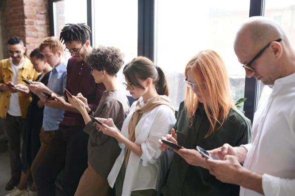 photo of people using smartphones
