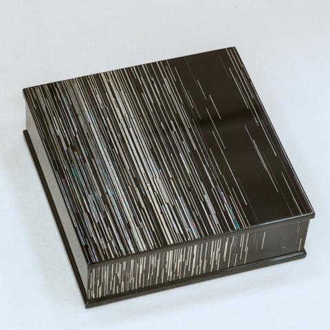 Abstract black lacquer box with iridescent thin striped inlay