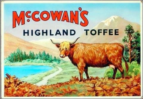 A McCowan's Highland Toffee Ad in the style of a travel poster with a Highland Cow standing in a pastoral scene featuring a loch and the Scottish Highlands