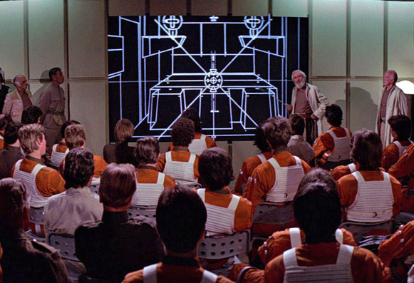 Screenshot from Star Wars scene where rebel pilots are being briefed on the plan to attack the Death Star.