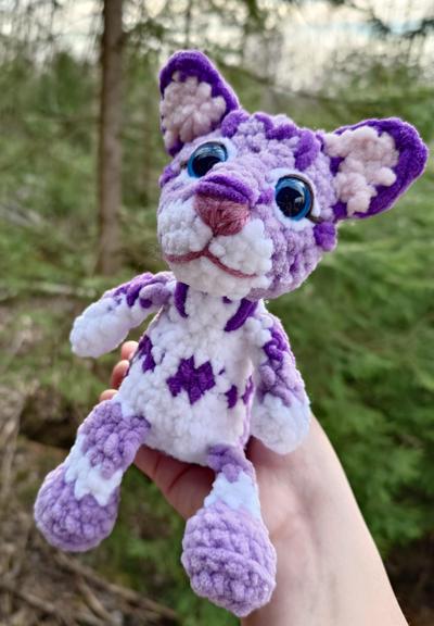 Crocheted purple cat plush
