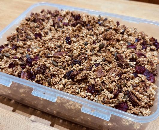 A Tupperware box full of home made granola