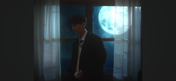 Dimly lit Seungmin in front of a window at night, holding a baseball. Behind him is a giant blue moon