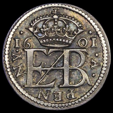 The royal monogram of Elizabeth I, who died on this day in 1603, artfully compresses all the letters of 'ELIZABETH R' into one cypher. Shown here on a pattern pledge penny from 1601.