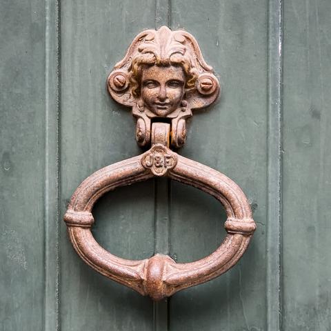 An ornate door knocker.