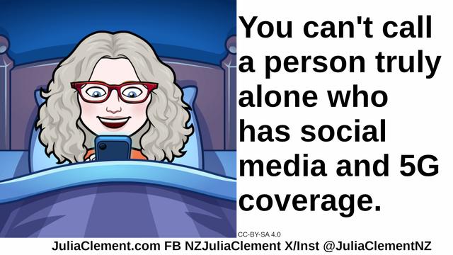 Julia in bed looking at her phone with a happy surprised expression. Text: You can't call a person truly alone who has social media and 5G coverage.