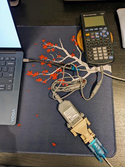 Photo of my laptop and TI-89 connected with the cables described in the post.