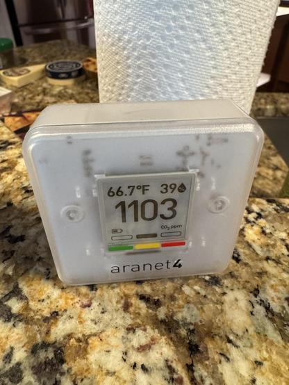An Aranet air quality sensor sits on a brownish countertop.  It is currently reading 66.7F and 39% humidity, but the big number is 1193 for the CO2 reading.

As someone who definitely gets headaches with high CO2 levels, this is something of a pain when smoke is high outdoors and one can't open a window.