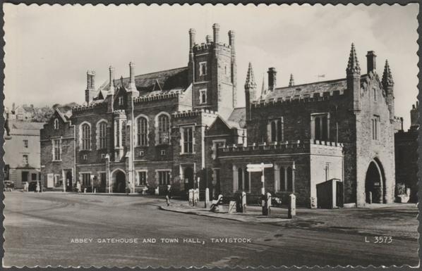 Monochrome real photographic postcard showing a view of the Abbey Gatehouse and Town Hall of Tavistock in Devon.

Published by Valentine & Sons Ltd, Dundee & London, No L 3573, photo registered in 1956, c.1950s.

Postally unused.

Very good condition, with minimal corner bumps and medium album marks.