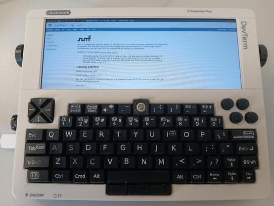 The DevTerm R01 running the suckless surf browser displaying the surf homepage.