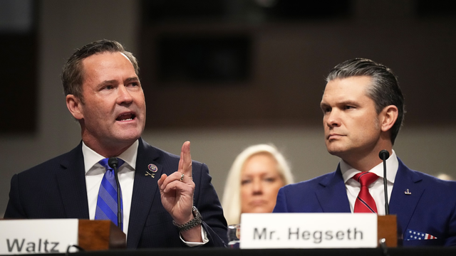 Waltz and Hegseth Seated adjacent to each other at hearing (chest shot)