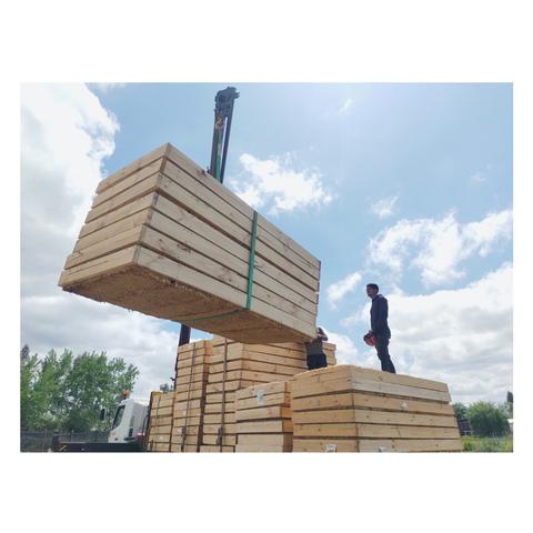 Straw panels get delivered.
