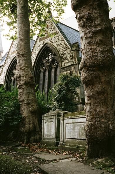 Kensington High Street is more of a shopping street with lots of shops and department stores. And then, on the corner, there is St Mary Abbots Church with picturesque tombs, stone slabs, a church building and a backyard garden. It's a must-see.