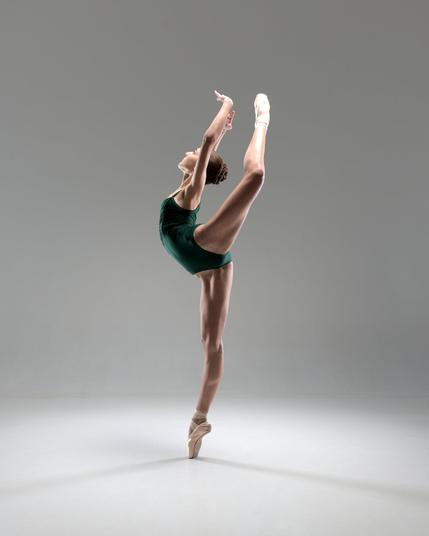 Ballerina Tamara brings elegance and strength to a ballet photoshoot in a Budapest photo studio. Capturing the fluidity of movement and the precision of technique, each pose reflects the artistry and grace of classical ballet in a refined studio setting. The interplay of light and shadow enhances the beauty of her form, turning dance into a visual masterpiece.