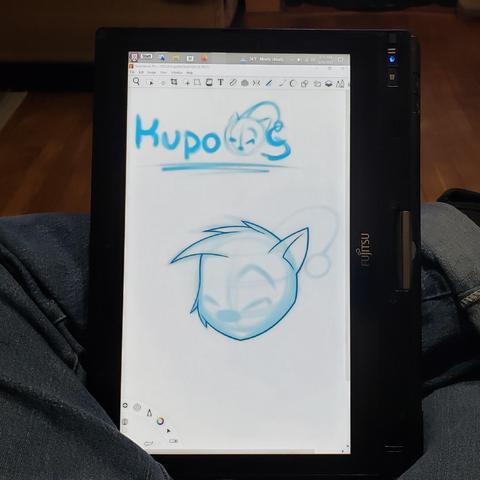 Photo of my Tablet PC Thingie. On screen are blue lined designs for a Moogle-themed "Kupo O S" logo. The text is very geometric with a Moogle head as the "O" in O S.