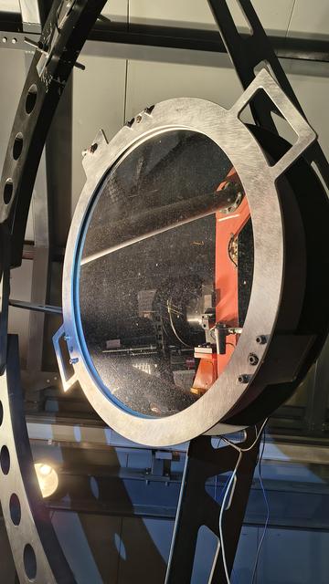 The secondary mirror of the MONET/N telescope with a jig installed for easier handling.
