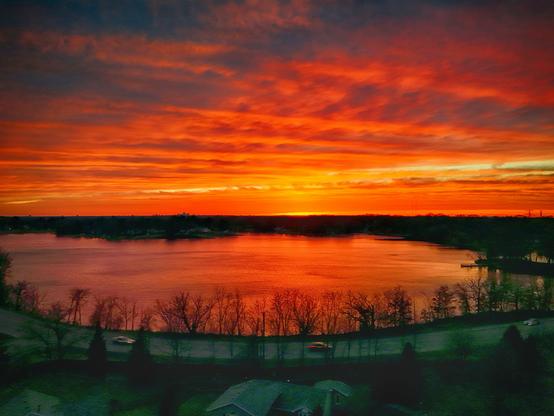 Sunset with a lake in the foreground