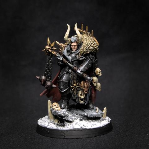 Angry dude with more furs, chain flails, skulls and plate than any normal man could bear - that's why he's a named character!