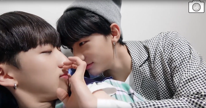 Hyunjin gets up in Changbin's face and puts a finger on his lips.