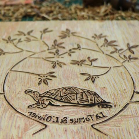 woodcut logo for an order
