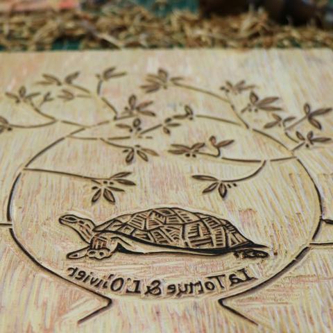 woodcut logo for an order