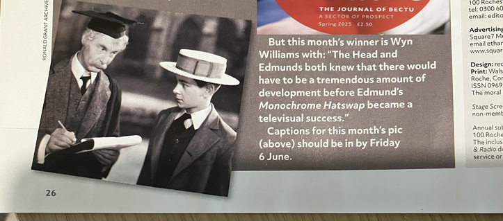 A public schoolboy looks up at his headmaster who is giving him a disapproving look. Caption reads "The Head and Edmunds both knew that there would have to be a tremendous amount of development before Edmund's "Monochrome Hatswap" became a televisual success.