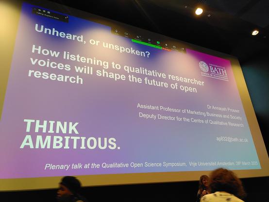 Title slide of the talk "Unheard or unspoken? How listening to qualitative researcher voices will shape the future of open research" by Annayah Prosser