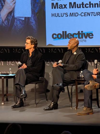 Matt Bomer and Nathan Lee Graham on stage, looking at the moderator