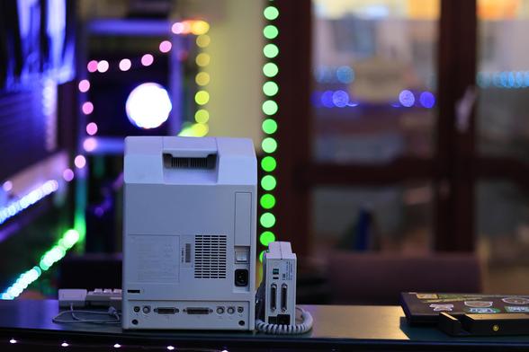 the picture shows a colorful impression of the hackerspace. some vintage H/W can be seen  on the counter in the foreground