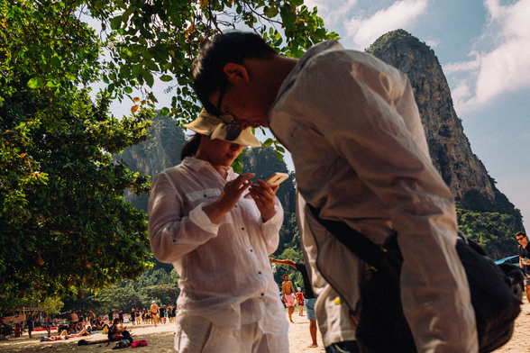 Two people on Railay Beach in Thailand.