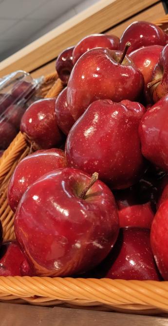 Polished, shiny apples in a basket