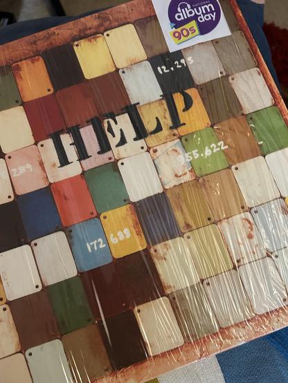 Front cover of the Help charity compilation LP