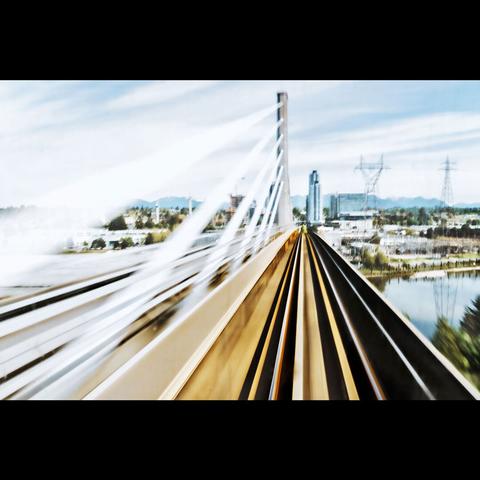 blur photo of a bridge from the train in Vancouver, British Columbia, Canada