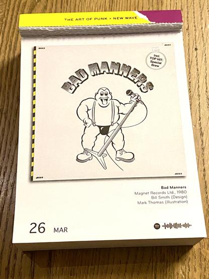Das Bild zeigt ein Albumcover der Band Bad Manners.

Im Mittelpunkt steht eine schwarz-weiße Cartoon-Zeichnung einer kräftig gebauten, glatzköpfigen Figur mit breitem Grinsen und herausgestreckter Zunge. Sie trägt Hosenträger, eine knappe schwarze Unterhose und klobige Stiefel. In der rechten Hand hält sie ein Mikrofon, das an einem Ständer befestigt ist.

Der Bandname “Bad Manners” ist in großen, leicht gebogenen, fetten Buchstaben über der Figur platziert.

Oben rechts im Bild befindet sich ein runder Aufkleber mit der Aufschrift “Incl. TOP HIT: Special Brew”, was auf einen enthaltenen Hit-Song hinweist.

Der linke Rand des Covers hat eine schwarz-gelbe Streifenmusterung, die an ein Warnmuster erinnert. Das gesamte Design wirkt verspielt und humorvoll, passend zum Stil der Band, die für ihre energiegeladene Ska-Musik und ihr schräges Image bekannt ist.