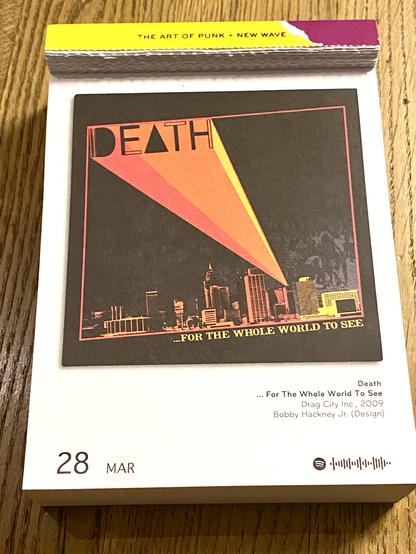 Das Bild zeigt das Albumcover von …For the Whole World to See der Band Death. Es hat einen schwarzen Hintergrund mit einer stilisierten Stadtsilhouette im unteren Bereich, die in Gelb- und Orangetönen gehalten ist. Darüber ist ein großes, dreieckiges Lichtbündel in Rot- und Orangetönen zu sehen, das von der oberen linken Ecke nach unten in die Stadt scheint.

Oben links steht der Bandname DEATH in einem minimalistischen, geometrischen Schriftstil, wobei das „A“ durch ein auf den Kopf gestelltes Dreieck ersetzt wurde. Unten am Bildrand befindet sich der Albumtitel …FOR THE WHOLE WORLD TO SEE in gelber Schrift.

Das Design wirkt retro-futuristisch und erinnert an Plakate oder Cover aus den 1970er Jahren.