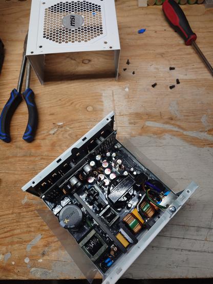 PSU with cover off showing internal electronics