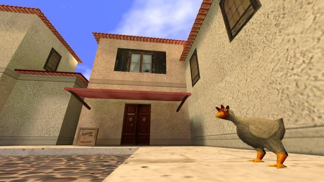 In this picture you can see a chicken standing at the market square. It has its head slightly bent to the right. So it looks as if it is looking at you. In the background you can see a house. This is two-storey. It has a double dark black entrance door, which is made of wood. To the left of the entrance is a small wooden box. Above this and the door or the whole front of the house is a red awning. To the left and right of the house with the awning, there are two other houses. This is on the map cs_italy in the game Counter-Strike 1.6.