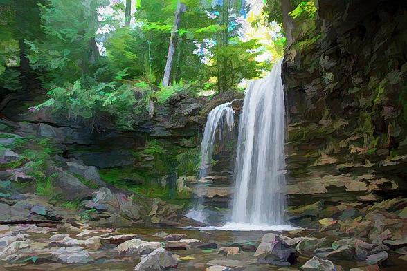 A view from the bottom of Hilton Falls as it plummets down to the river below in a forest near Milton, Ontario.
