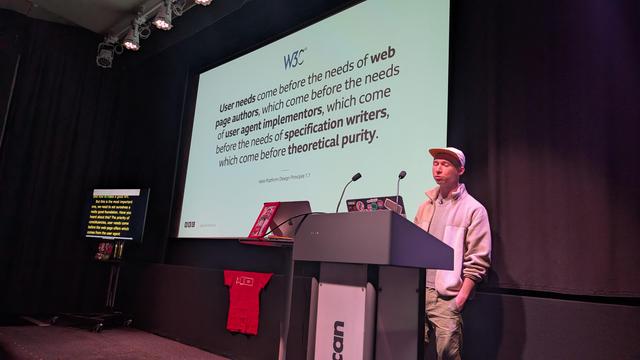 Josh on stage speaking