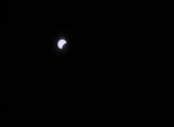 The pinhole produces a clear image of the Sun