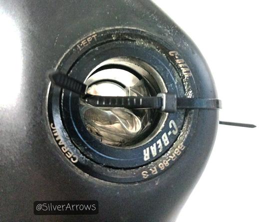 The bottom bracket shell (?) of a carbon bike saying C Bear. I think it means ceramic bearings?