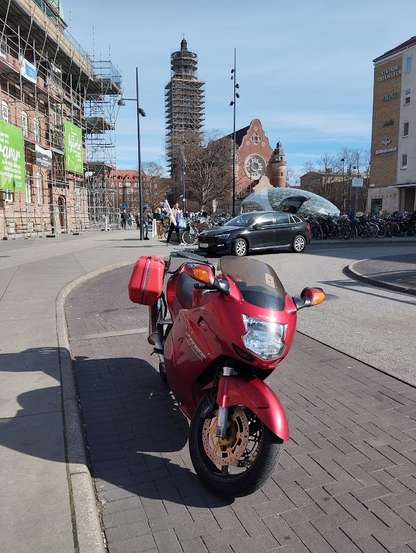 My red Honda Super Blackbird CBR1100XX. In the background the church of Johannes, in restoration.