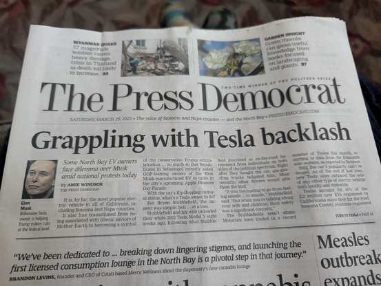 The front page of the Santa Rosa Press Democrat, top story is Grappling with Tesla backlash"
